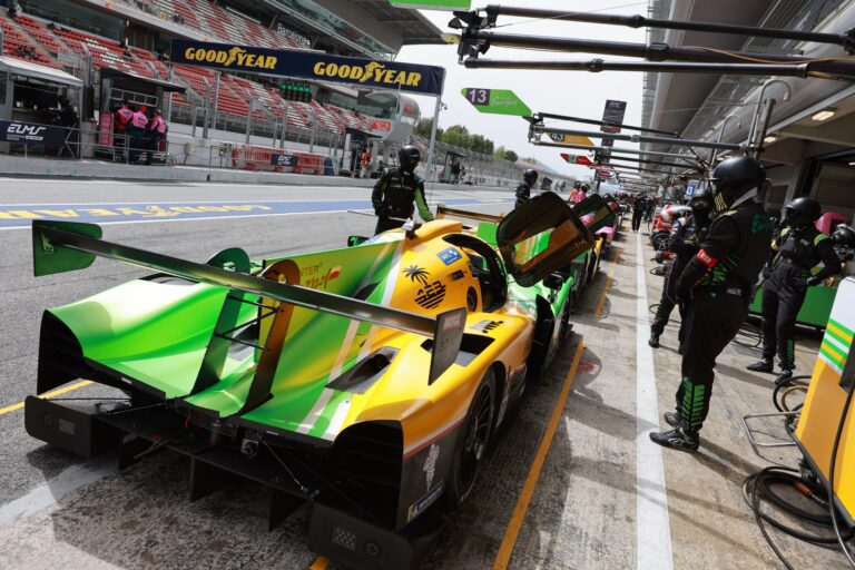 Barcelona, Spain. 11th Apr 2026. #34 Oreca 07 - Gibson of Bijoy GARG (USA) and Reshad DE GERUS (FRA) (INTER EUROPOL COMPETITION) pit crew stands ready beside a race car with its cockpit open, preparing for service as other teams line the pit lane under overcast skies.. Credit: Craig Allan-McWilliams