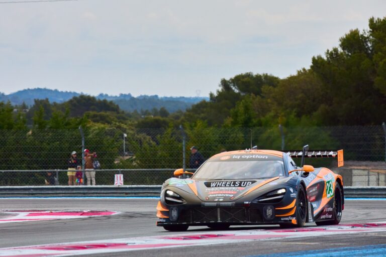 3rd May 2026. #23 McLaren 720S LMGT3 Evo of Michael BIRCH (GBR) and Garnet PATTERSON (AUS) and Wayne BOYD (GBR) (UNITED AUTOSPORTS) McLaren navigates a braking zone under pressure, its rear wing angled for stability as spectators watch from behind the fence. Credit: Craig Allan-McWilliams